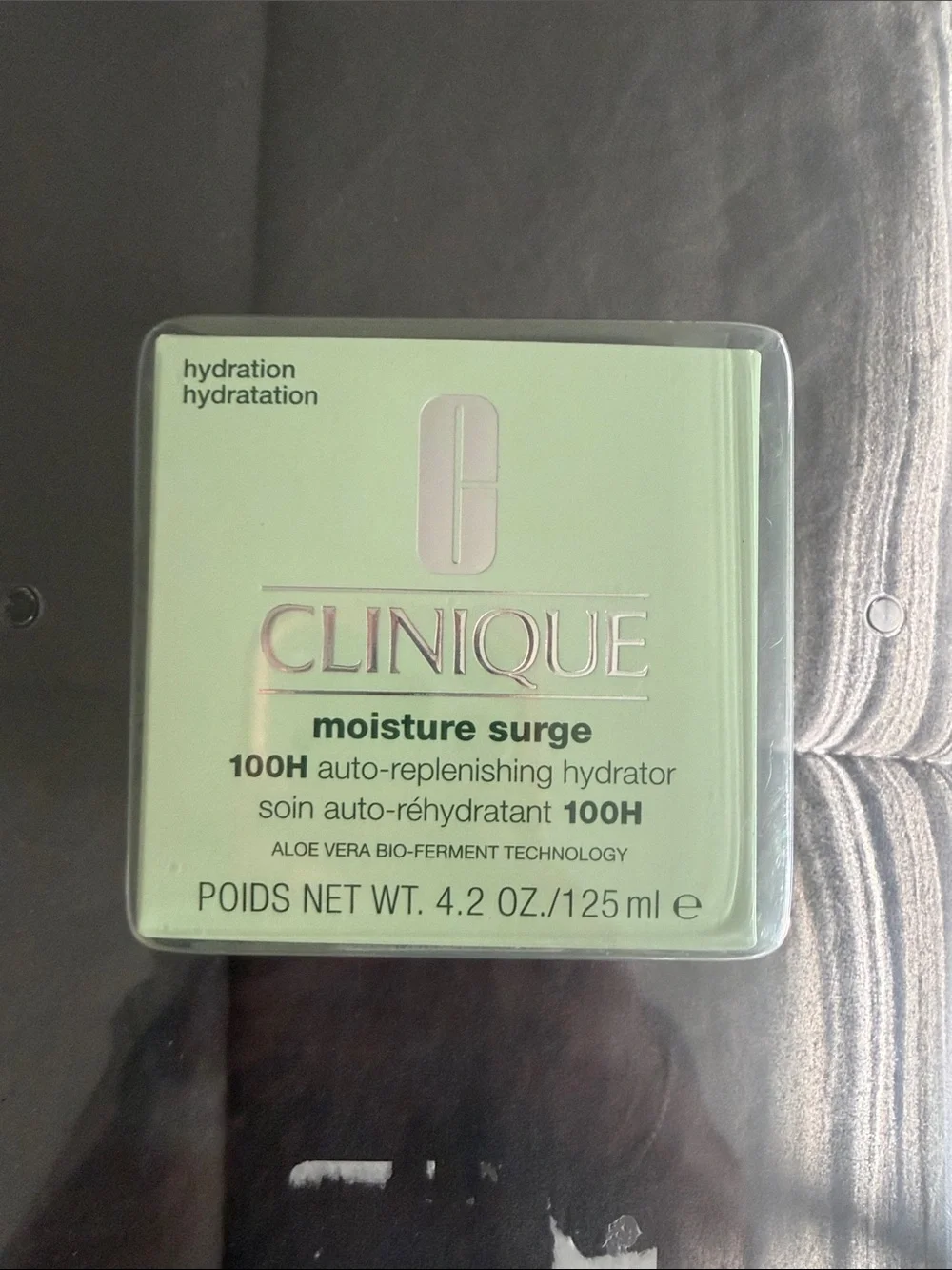 Clinique Moisture Surge Hydrator - Pink and Silver Jar